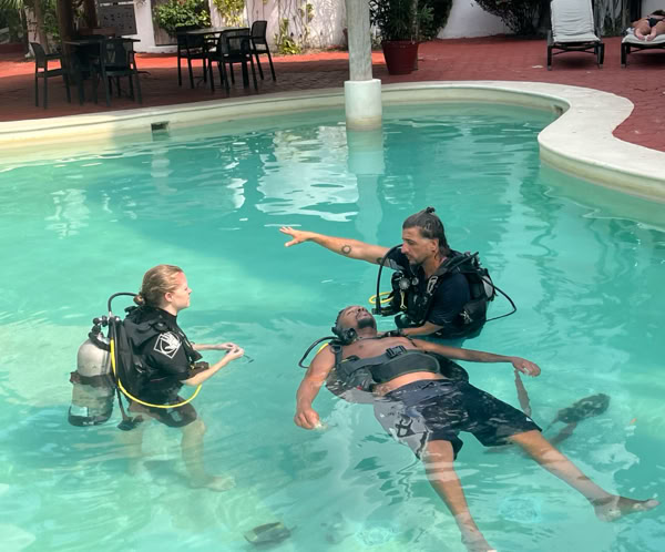 Paramedic arranging equipment inside an ambulance, ensuring readiness for emergencies.